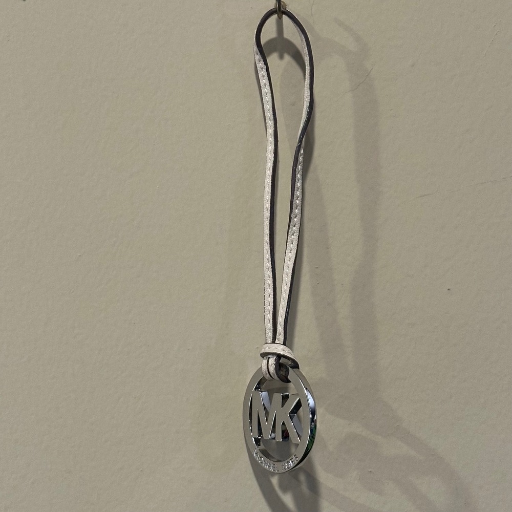 Michael Kors Silver Tone MK Logo Bag Charm White Leather Strap Accessory